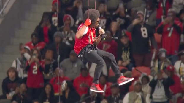Ludacris performs for Falcons fans.